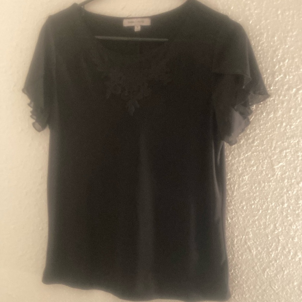 Black sheer blouse.